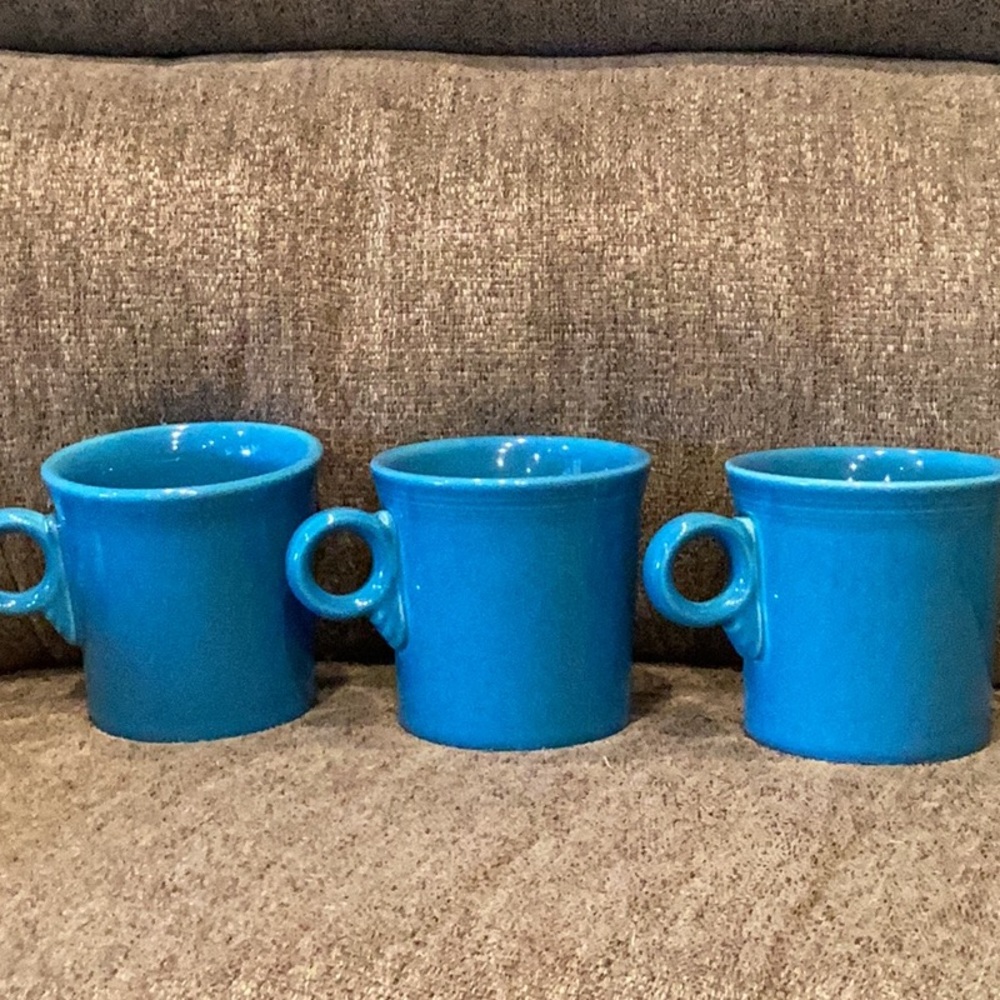 Three fiestaware mugs. Made in USA.